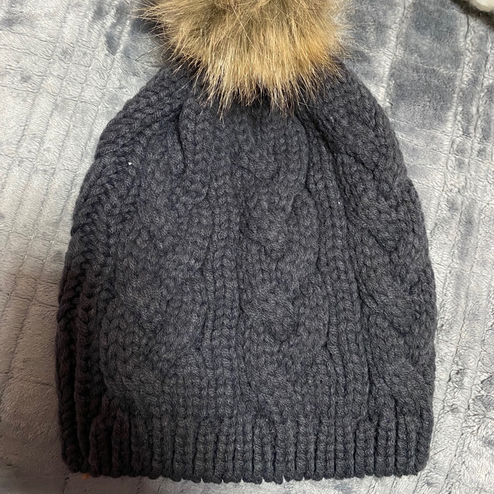 Gray hat with pom